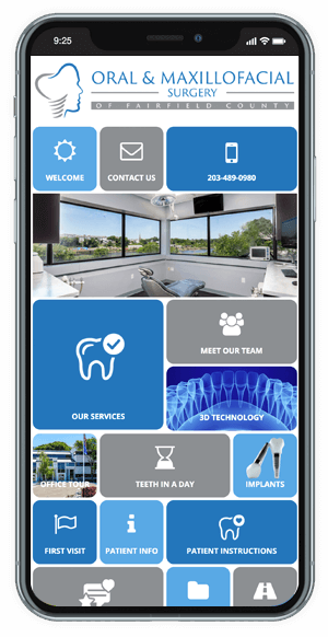 smart phone with the oral and maxillofacial surgery of fairfield county app on the screen